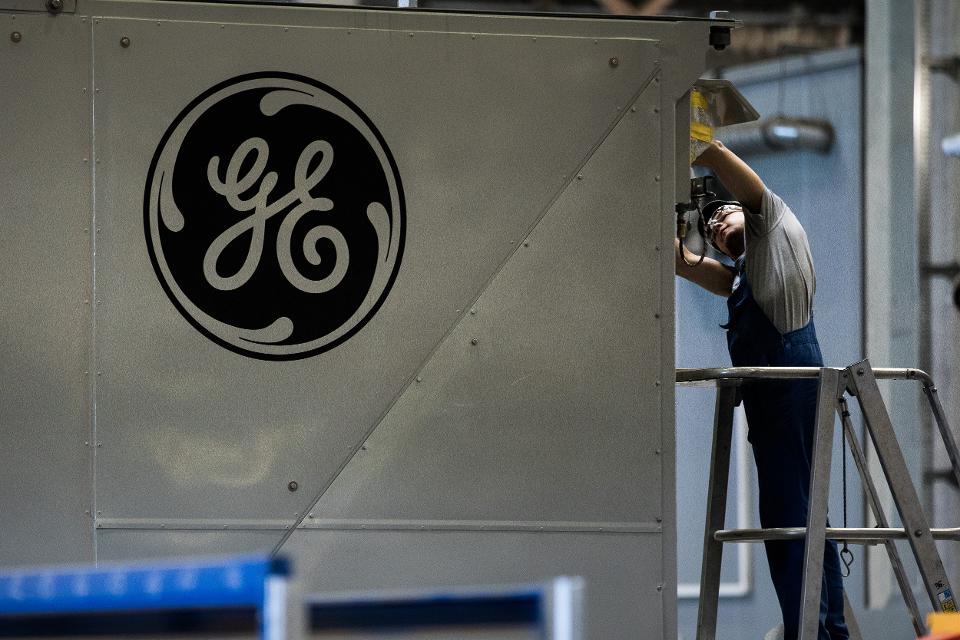 GE logo at plant in Hungary, 2017, Bloomberg